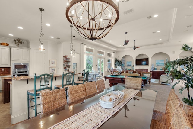 4701 Seastar Vis, Destin, FL 32541 - dining space with billiards, light tile patterned floors, recessed lighting, a raised ceiling, and crown molding