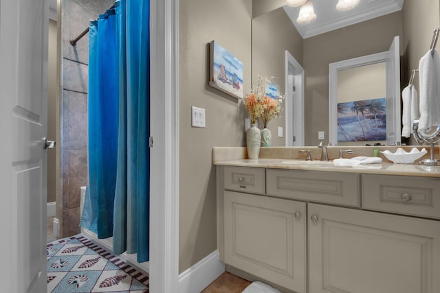 4701 Seastar Vis, Destin, FL 32541 - full bath with vanity, curtained shower, crown molding, baseboards, and tile patterned flooring