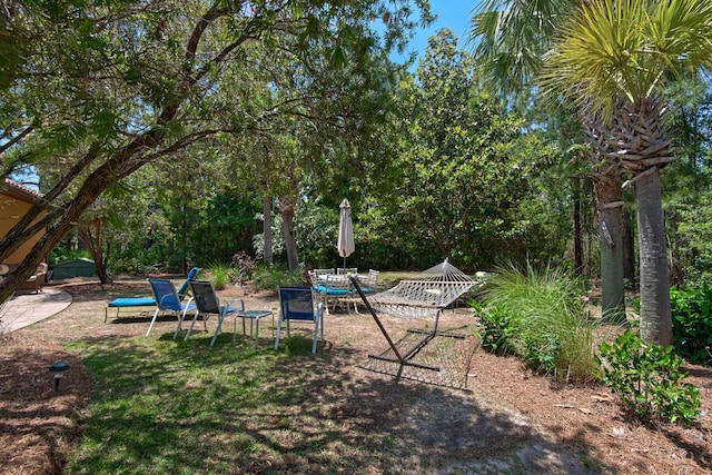 4701 Seastar Vis, Destin, FL 32541 - view of yard featuring a patio and outdoor dining area