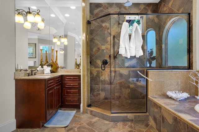 4701 Seastar Vis, Destin, FL 32541 - bathroom with crown molding, a shower stall, vanity, a garden tub, and a chandelier