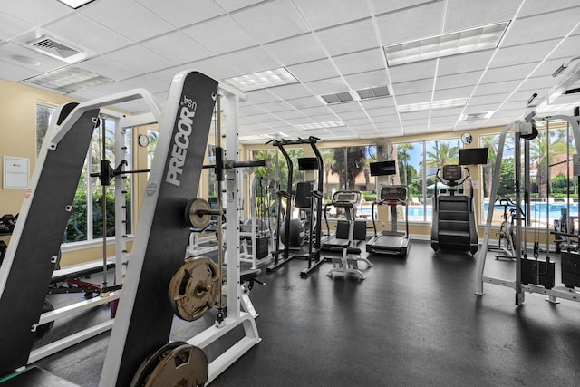 4701 Seastar Vis, Destin, FL 32541 - workout area featuring a drop ceiling and plenty of natural light