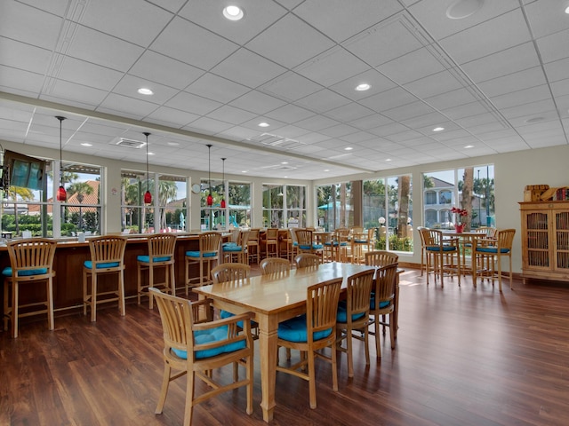 4701 Seastar Vis, Destin, FL 32541 - dining room featuring wood finished floors, a paneled ceiling, and recessed lighting