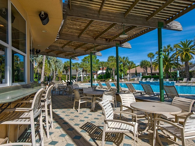 4701 Seastar Vis, Destin, FL 32541 - view of patio with a community pool and a pergola