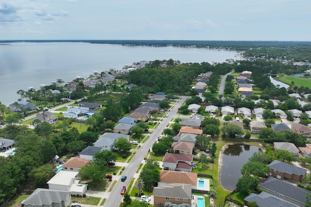 137 Loblolly Bay Dr, Santa Rosa Beach, FL 32459 - aerial view of property and surrounding area with a large body of water and nearby suburban area