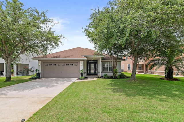 137 Loblolly Bay Dr, Santa Rosa Beach, FL 32459 - single story home featuring stucco siding, an attached garage, a front yard, and concrete driveway