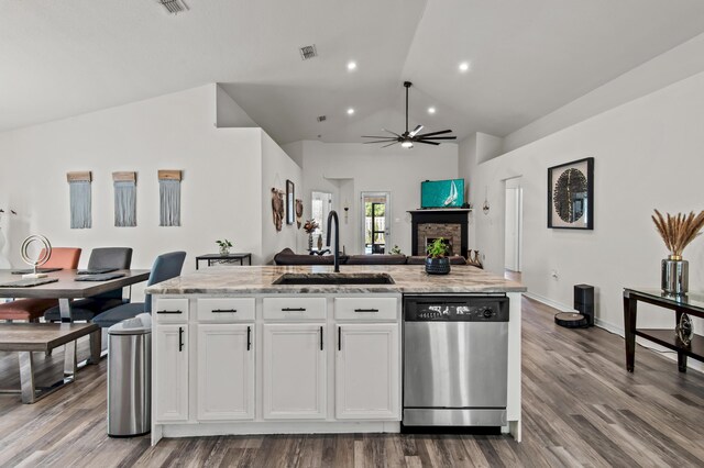 137 Loblolly Bay Dr, Santa Rosa Beach, FL 32459 - kitchen with stainless steel dishwasher, a sink, lofted ceiling, ceiling fan, and white cabinets