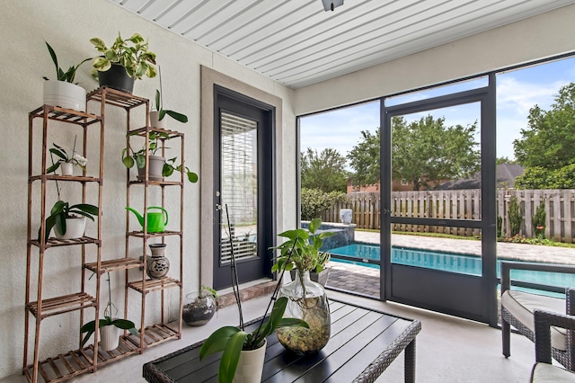 137 Loblolly Bay Dr, Santa Rosa Beach, FL 32459 - sunroom / solarium featuring a textured wall