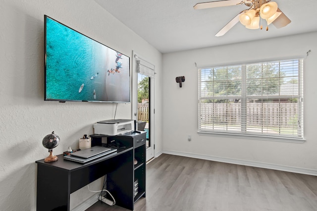 137 Loblolly Bay Dr, Santa Rosa Beach, FL 32459 - home office with wood finished floors, ceiling fan, and baseboards