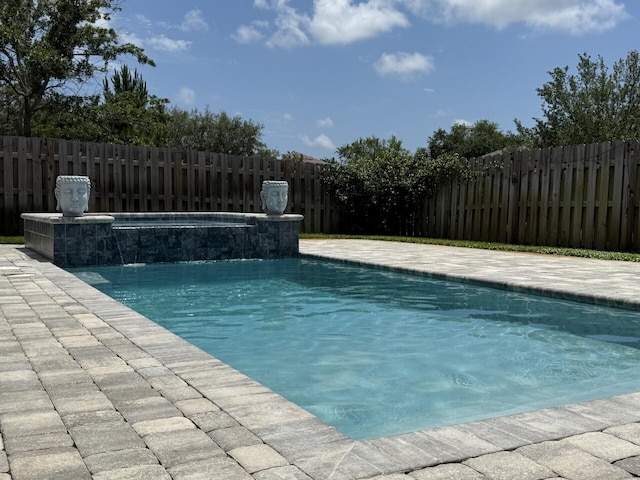 137 Loblolly Bay Dr, Santa Rosa Beach, FL 32459 - view of swimming pool featuring a fenced backyard and an outdoor hot tub