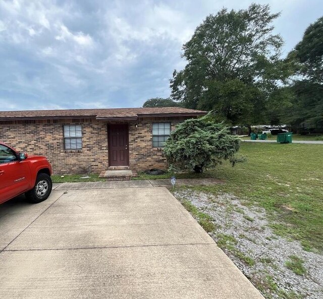 818 Lark St Unit 1, 2, 3, 4, Fort Walton Beach, FL 32547 - view of front of home featuring a front yard and brick siding
