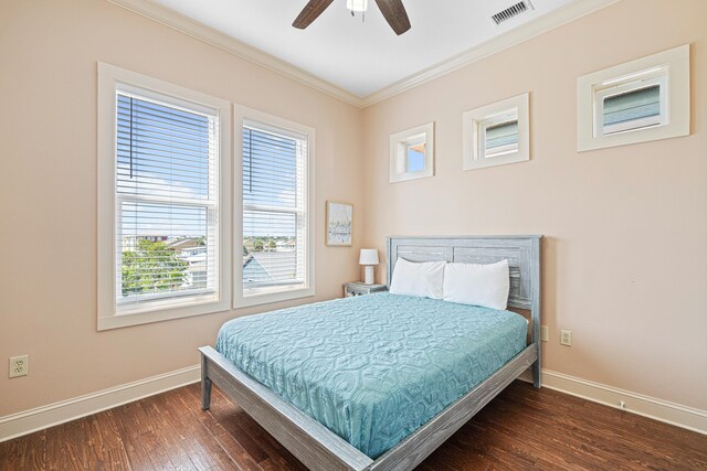 6236 Thomas Dr, Panama City Beach, FL 32408 - bedroom featuring ornamental molding, baseboards, hardwood / wood-style floors, and ceiling fan