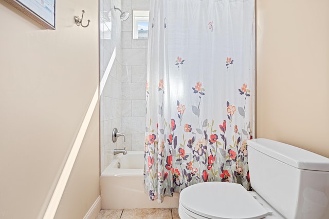 6236 Thomas Dr, Panama City Beach, FL 32408 - bathroom featuring toilet, shower / bathtub combination with curtain, and tile patterned floors