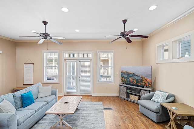 6236 Thomas Dr, Panama City Beach, FL 32408 - living area featuring ceiling fan, crown molding, light wood-style flooring, recessed lighting, and baseboards