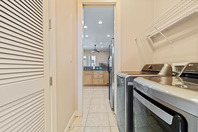 6236 Thomas Dr, Panama City Beach, FL 32408 - laundry room featuring washing machine and clothes dryer, light tile patterned flooring, recessed lighting, and ceiling fan