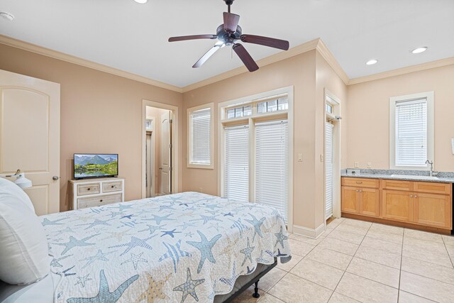 6236 Thomas Dr, Panama City Beach, FL 32408 - bedroom with a sink, crown molding, light tile patterned flooring, recessed lighting, and baseboards