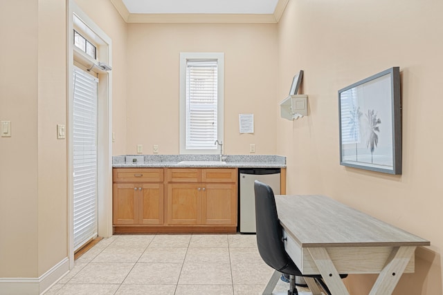 6236 Thomas Dr, Panama City Beach, FL 32408 - home office featuring a sink, light tile patterned floors, and crown molding