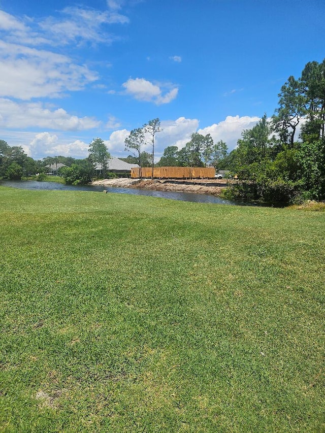 3733 Tiger Point Blvd, Gulf Breeze, FL 32563 - view of grassy yard featuring a water view