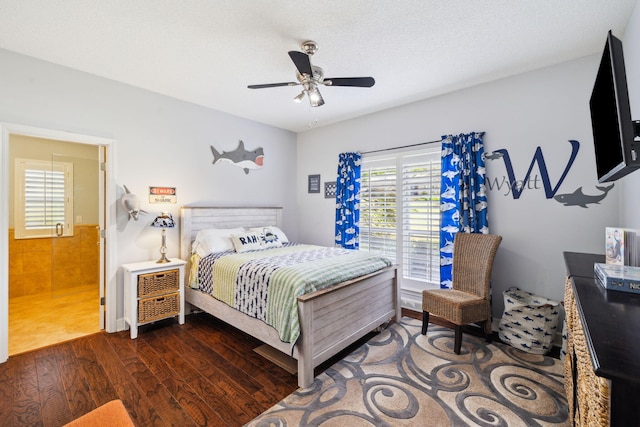 2009 Kildare Cir, Niceville, FL 32578 - bedroom with multiple windows, wood finished floors, and a ceiling fan
