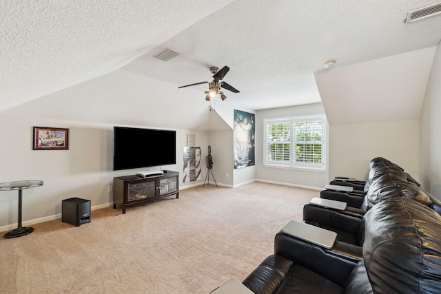 2009 Kildare Cir, Niceville, FL 32578 - living area with light colored carpet, vaulted ceiling, ceiling fan, baseboards, and a textured ceiling