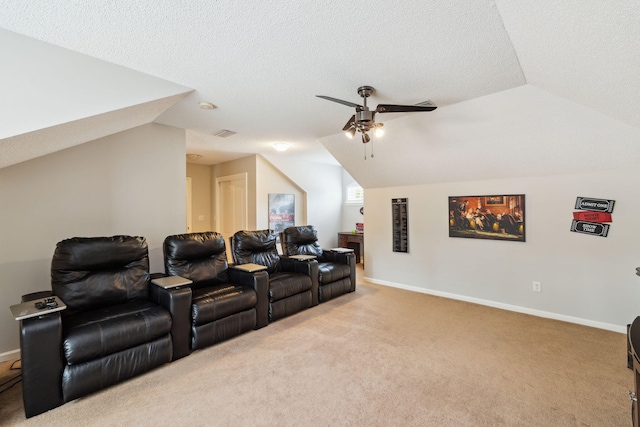 2009 Kildare Cir, Niceville, FL 32578 - home theater room featuring ceiling fan, lofted ceiling, light carpet, baseboards, and a textured ceiling