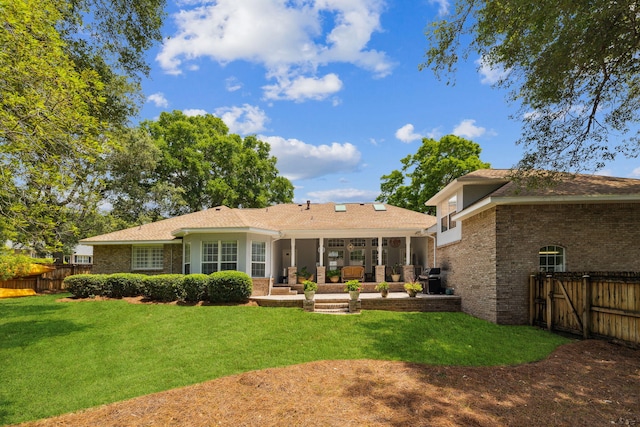 2009 Kildare Cir, Niceville, FL 32578 - back of house featuring brick siding and a patio area