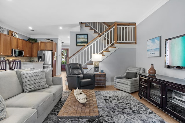 8603 Magnolia Bay Ln, Miramar Beach, FL 32550 - living area featuring ornamental molding, stairway, and recessed lighting