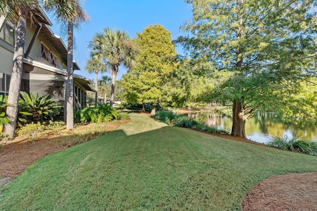 8603 Magnolia Bay Ln, Miramar Beach, FL 32550 - view of grassy yard featuring a water view