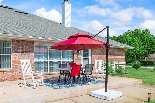 2424 Pineneedle Dr, Navarre, FL 32566 - view of patio with outdoor dining area