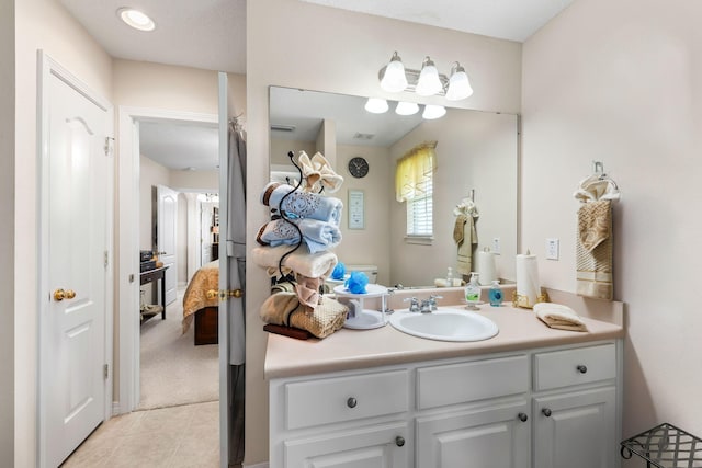 2424 Pineneedle Dr, Navarre, FL 32566 - ensuite bathroom with vanity and tile patterned flooring