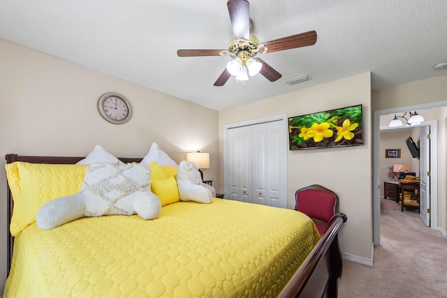 2424 Pineneedle Dr, Navarre, FL 32566 - bedroom with a closet, light colored carpet, and a ceiling fan