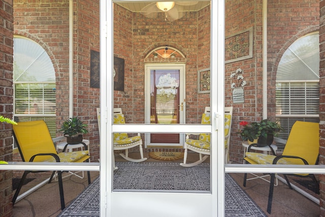 2424 Pineneedle Dr, Navarre, FL 32566 - property entrance featuring brick siding and covered porch