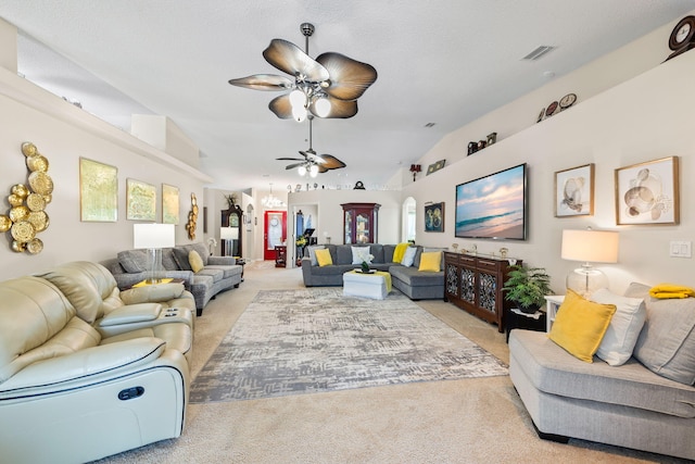 2424 Pineneedle Dr, Navarre, FL 32566 - living room with light carpet, lofted ceiling, ceiling fan, and a chandelier