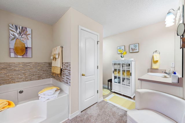 2424 Pineneedle Dr, Navarre, FL 32566 - full bathroom with a bath, a textured ceiling, and vanity