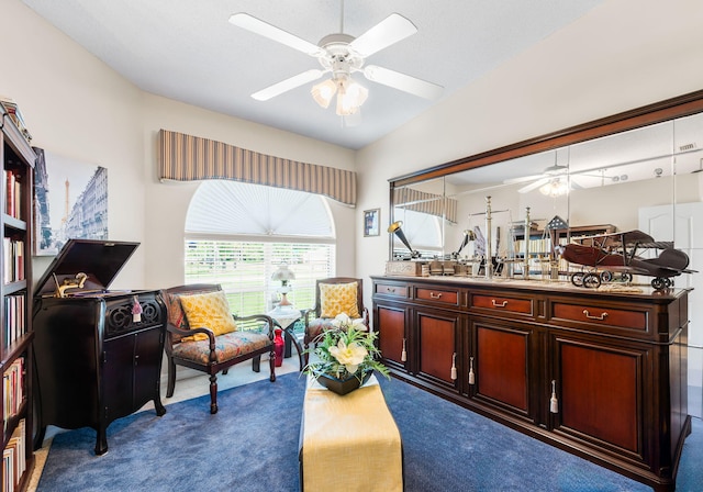 2424 Pineneedle Dr, Navarre, FL 32566 - sitting room featuring a ceiling fan and carpet