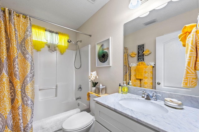 2424 Pineneedle Dr, Navarre, FL 32566 - bathroom featuring vanity, shower / bath combo, and a textured ceiling