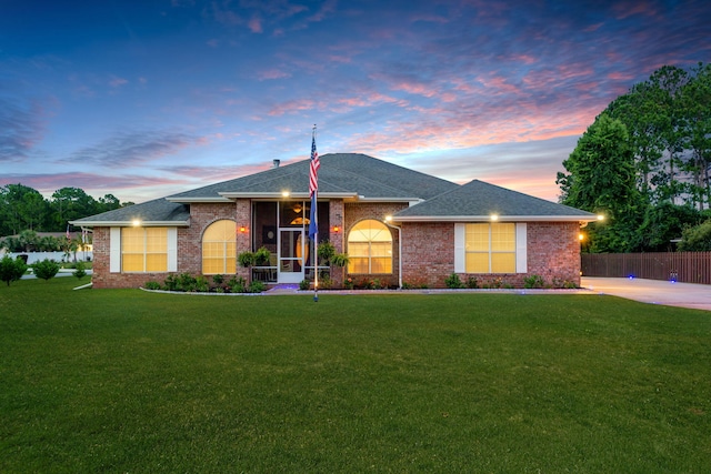 2424 Pineneedle Dr, Navarre, FL 32566 - ranch-style house featuring brick siding and roof with shingles