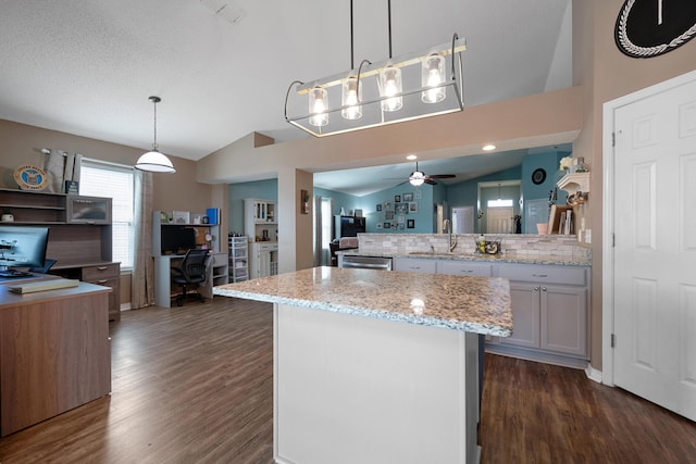 104 Sandstone Trl, Crestview, FL 32539 - kitchen featuring a desk, dark wood-type flooring, open floor plan, a peninsula, and a ceiling fan