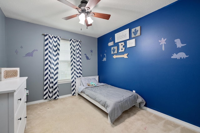 104 Sandstone Trl, Crestview, FL 32539 - bedroom with light colored carpet, ceiling fan, and baseboards