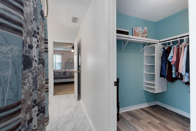 104 Sandstone Trl, Crestview, FL 32539 - spacious closet featuring a ceiling fan
