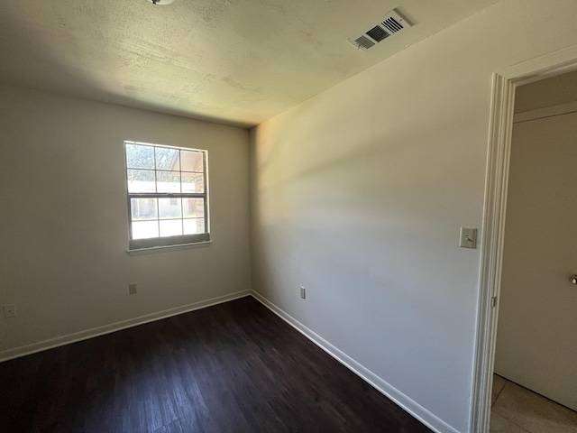 816 Lark St Unit 5, 6, 7, 8, Fort Walton Beach, FL 32547 - empty room with dark wood-style flooring and baseboards