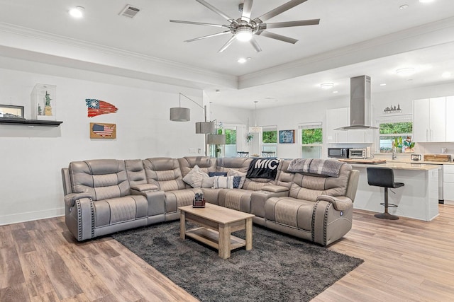 736 Commanche St, Fort Walton Beach, FL 32547 - living area featuring ornamental molding, a ceiling fan, light wood finished floors, recessed lighting, and healthy amount of natural light