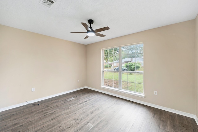 3167 Border Creek Dr, Crestview, FL 32539 - unfurnished room featuring ceiling fan, dark wood-type flooring, and baseboards