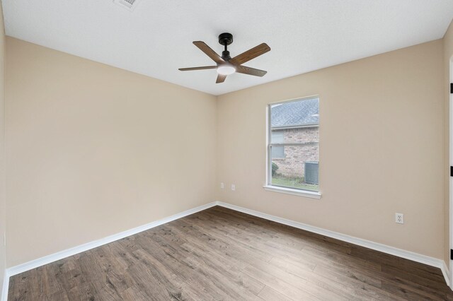 3167 Border Creek Dr, Crestview, FL 32539 - unfurnished room with wood finished floors, ceiling fan, and baseboards
