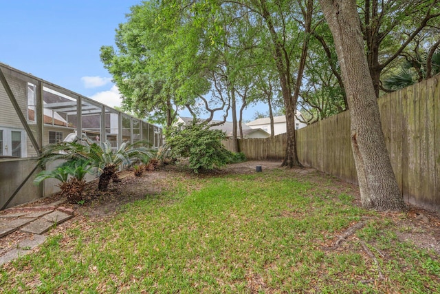 859 Mande Ct, Shalimar, FL 32579 - view of yard featuring a lanai