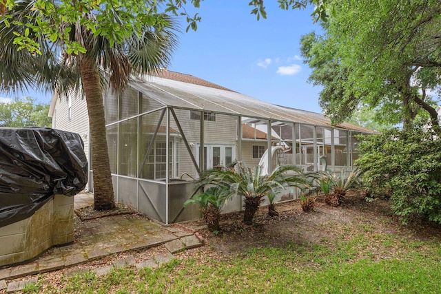 859 Mande Ct, Shalimar, FL 32579 - view of home's exterior with a lanai