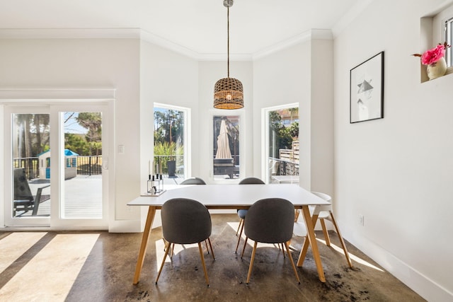 dining area with baseboards, ornamental molding, and an office area