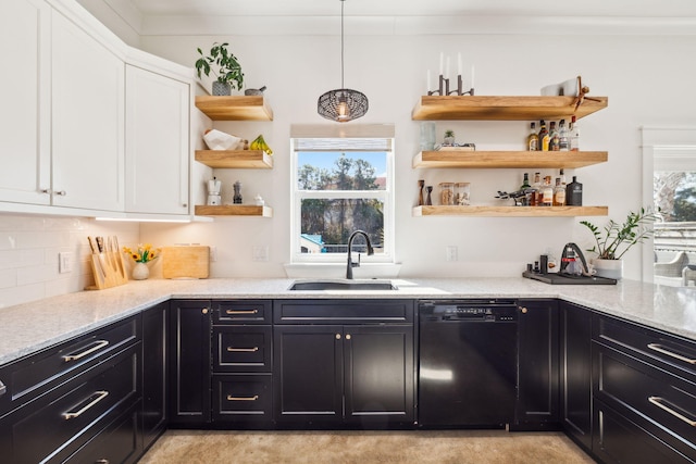 kitchen featuring black dishwasher, a sink, open shelves, and white cabinets
