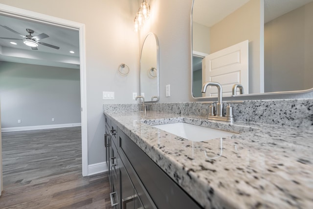 1432 Madelyn Woods Dr, Pensacola, FL 32506 - full bath with baseboards, wood finished floors, recessed lighting, double vanity, and ceiling fan