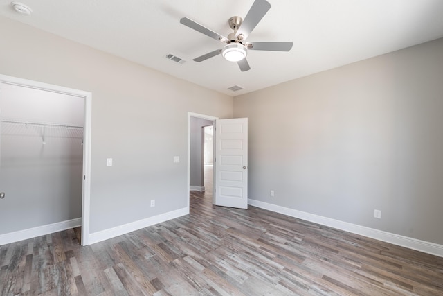 1432 Madelyn Woods Dr, Pensacola, FL 32506 - unfurnished bedroom featuring wood finished floors, baseboards, and a closet