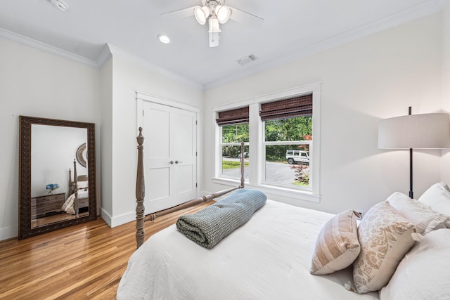 196 Summer Breeze Ln, Santa Rosa Beach, FL 32459 - bedroom featuring crown molding, light wood finished floors, baseboards, a ceiling fan, and recessed lighting